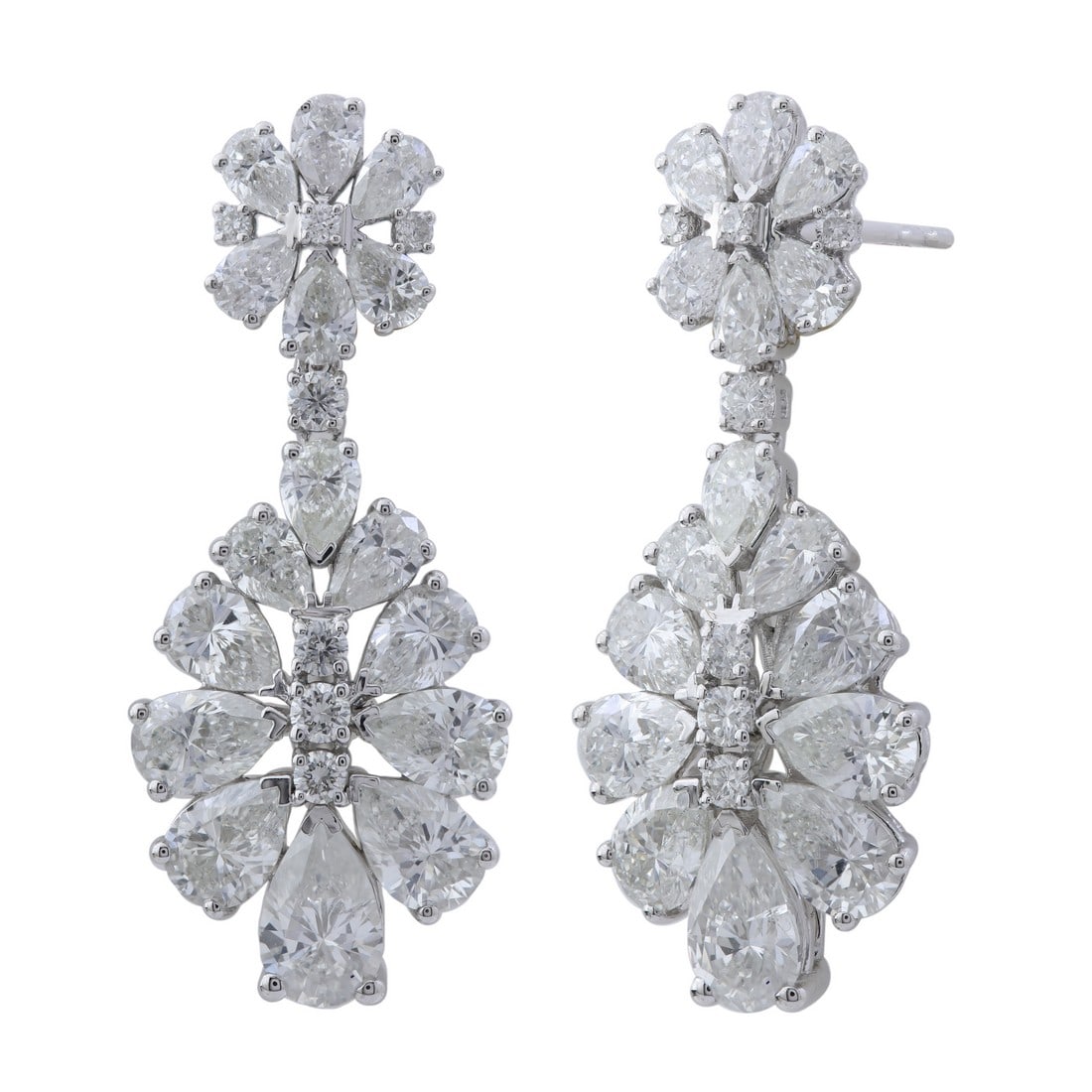 18K White Gold 6.25 tcw Natural Diamond Earrings: Gold Type: 18K White Gold Approximate Total Gold Weight (gm): 6.65 Natural Diamond Shape(s): Round/Pear Total Natural Diamond Weight: 6.25 carat No. of Natural Diamonds: 46 Color of Natural