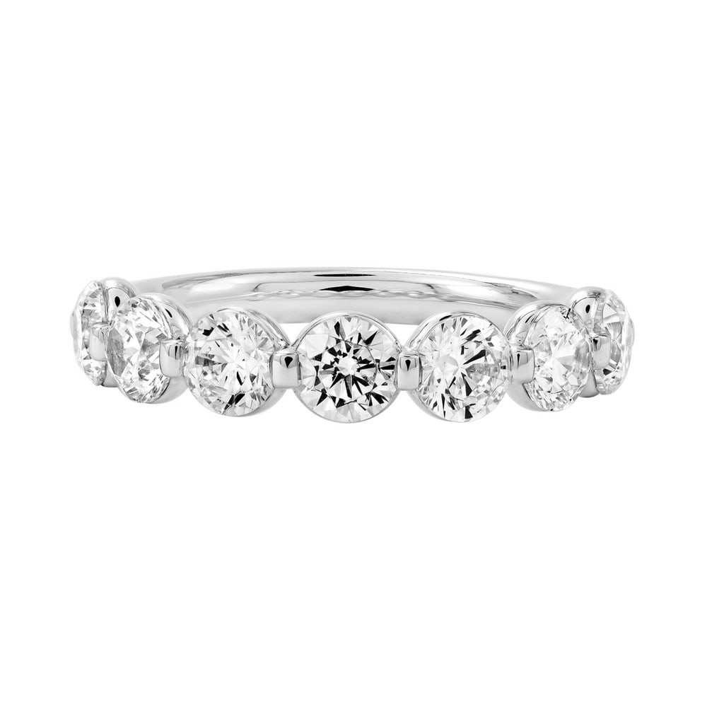 18kt White Gold 2.10ct Diamond Round cut 7 Diamond Wedding Band: Gold Content: 18kt White Gold Size (US): 7 Gold Weight in gram (approximate): 3.44 Shape of Diamonds: Round # of diamonds Including Center: 7 Size Range of Diamonds: 0.30-0.33ct Color Range : G-