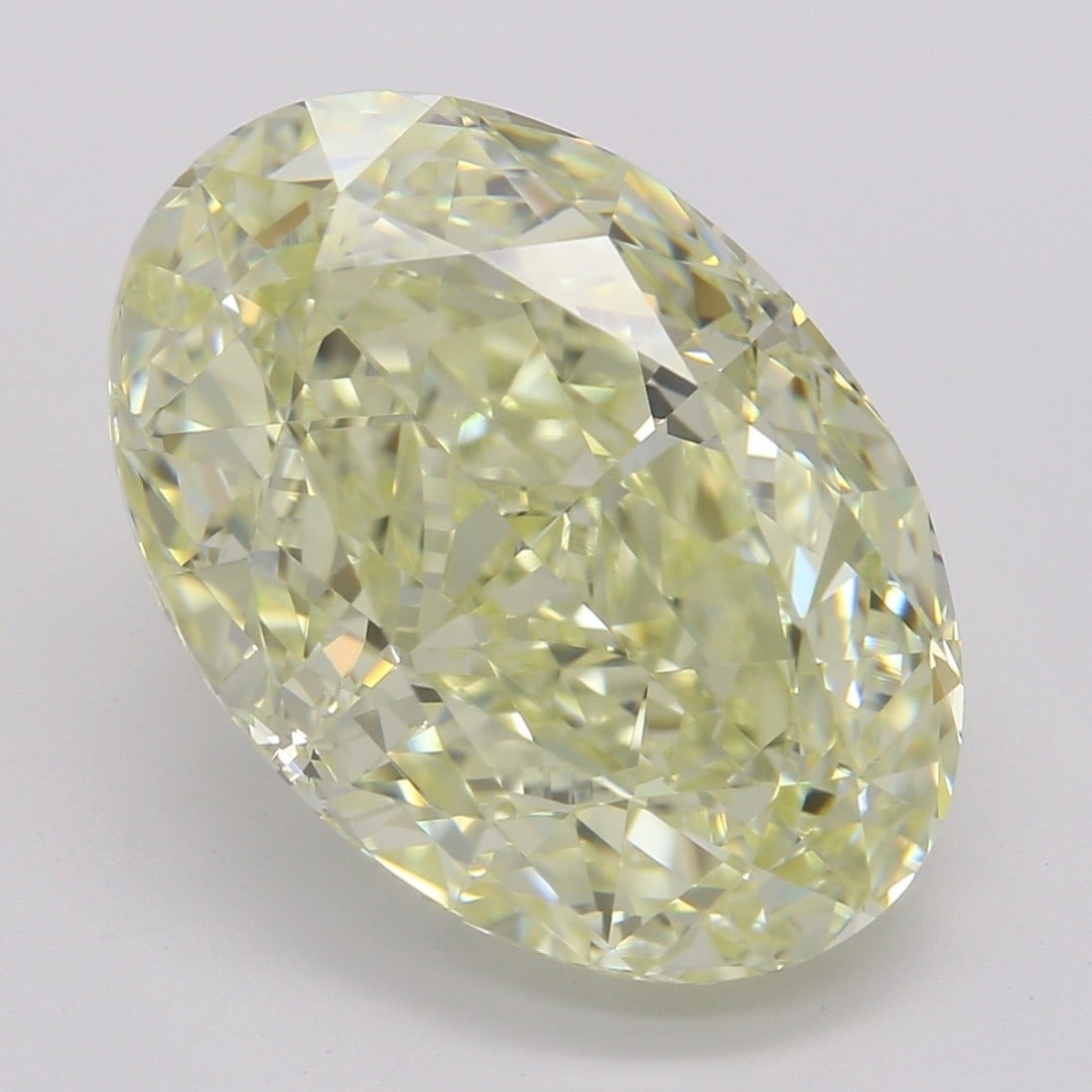5.38 ct, Fancy Lt. Yellow/VVS2, Oval cut GIA Diamond (1 of 6)