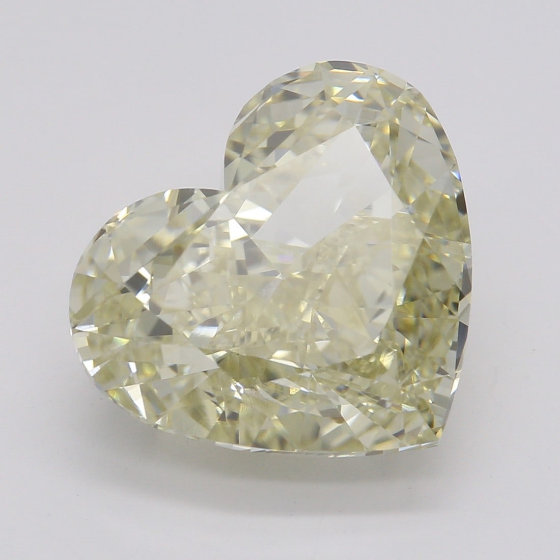 5.02 ct, Fancy Brn. Yellow/VVS2, Heart cut GIA Diamond: Click here to view HD 360 Spinning Image GIA G