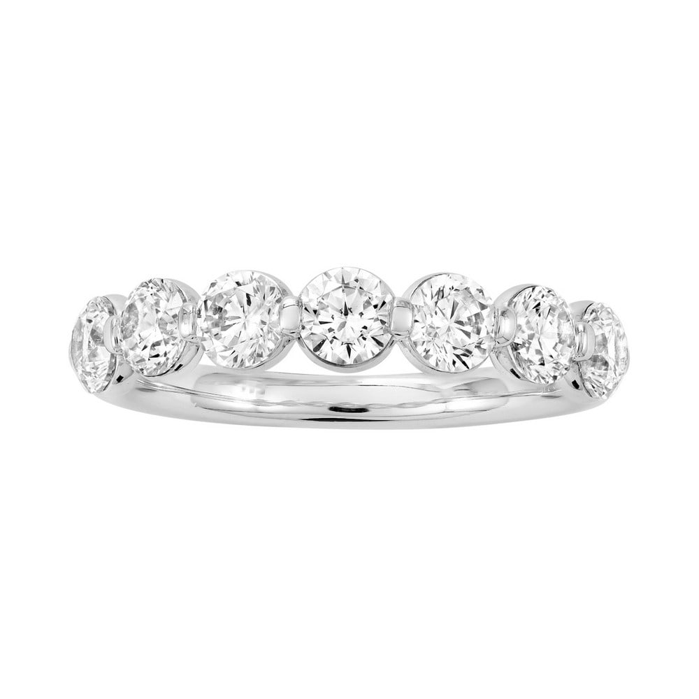 18kt White Gold 1.33ct Diamond Round cut 7 Diamond Wedding Band: Gold Content: 18kt White Gold Size (US): 7 Gold Weight in gram (approximate): 3.04 Shape of Diamonds: Round # of diamonds Including Center: 7 Size Range of Diamonds: 0.19-0.20ct Color Range : G-
