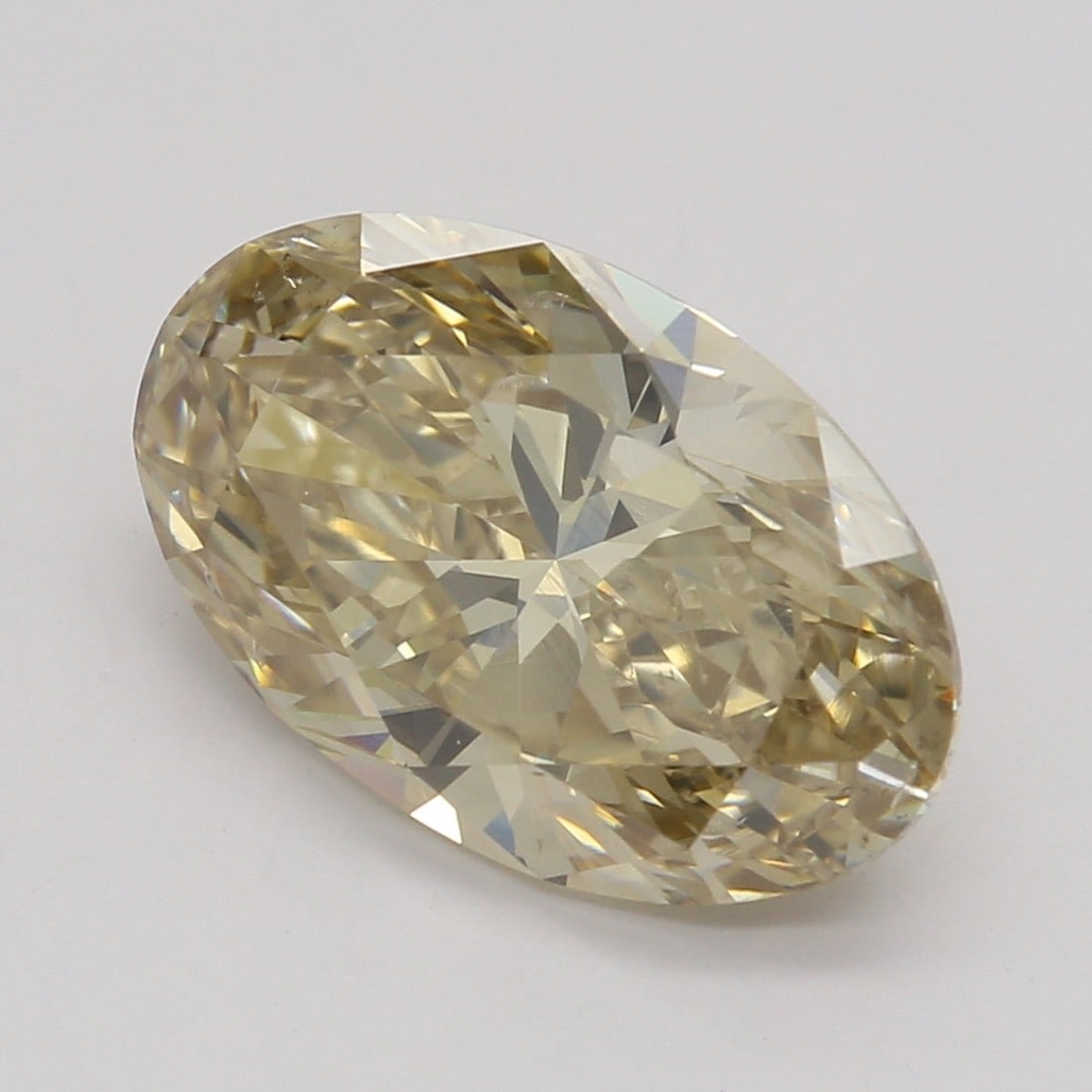 2.02 ct, Fancy Yellow Brown/SI1, Oval cut GIA Diamond: Click here to view HD 360 Spinning Image GIA G