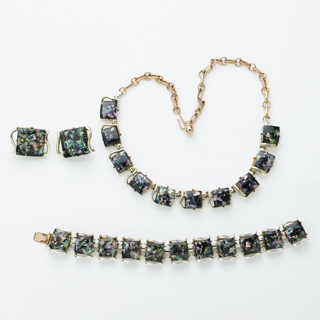 CORO - Vintage Papure mit blauem Straß und Perlen (3 Teile): CORO - Vintage Papure mit blauem Straß und Perlen (3 Teile)Collier, Armband und Paar Ohrclips Coro Jewelry, Cohn & Rosenberger, Inc., New York, USA. 1950er - 1960er Jahre. Metall, Gold-platiniert