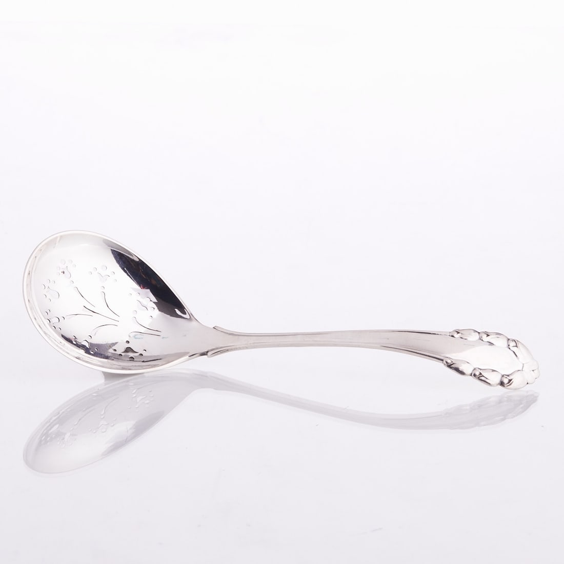 Art Nouveau Sifting Spoon Rose: Art Nouveau Sifting Spoon Rose Georg Jensen/Copenhagen/Denmark, circa 1915/27. Design: Georg Jensen. 830 silver. Hallmarks: maker's mark, 830, mod.: 1. L. 17.8 cm. Weight: 50 g.