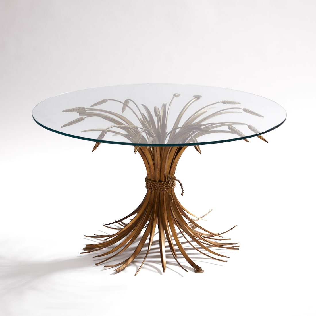 Florentine Regency Table: Florentine Regency Table Germany, circa 1960. Design: Hans Kögl. Metal. Gold-brown patinated. D. 80 cm. H. 45 cm. Kögl often drew on natural forms such as sheaves of wheat, Florentine flowers, and w