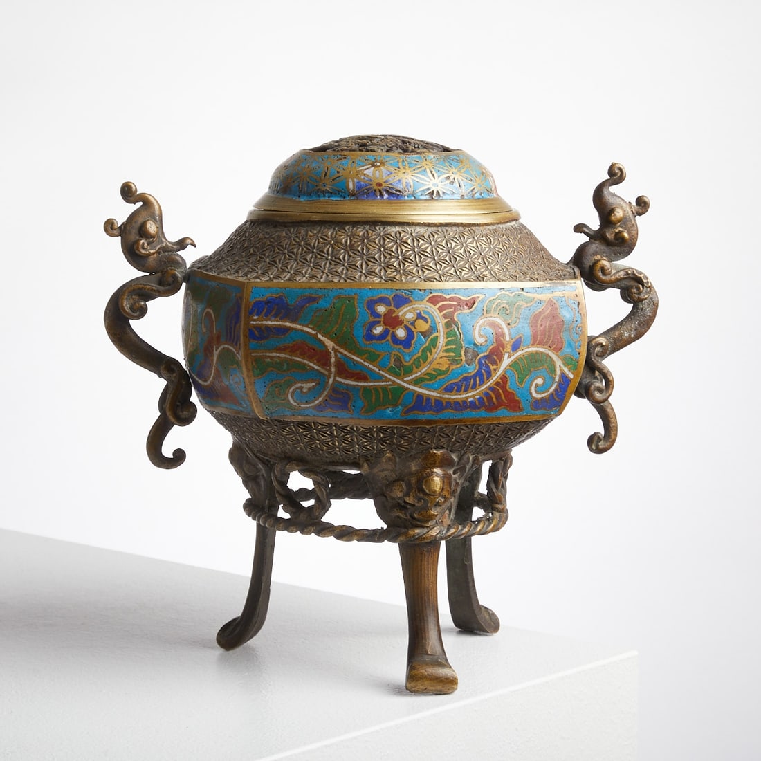 Large Cloisonné Incense Burner with Qilin Handles: Large Cloisonné Incense Burner with Qilin Handles China, probably 19th century. Bronze, rectangular base with three feet. H. 22 cm, D. approx. 17 cm. Unsigned. Body and lid inlaid with multicol
