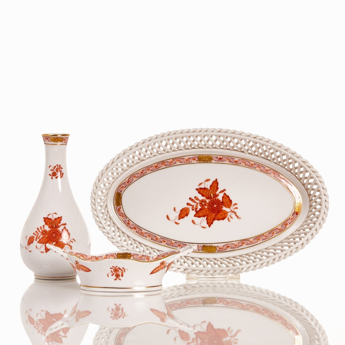 Narrow-neck vase, fitted bowl, oval pierced basket - Apponyi, orange (AOG). Herend 1960s-1970s.: Narrow-neck vase, fitted bowl, oval pierced basket - Apponyi, orange (AOG) Herend Porcelain Manufactory, Herend 1960s-1970s. Porcelain, white, glazed. Painted orange and gold. Gold rim. Blue mark on t