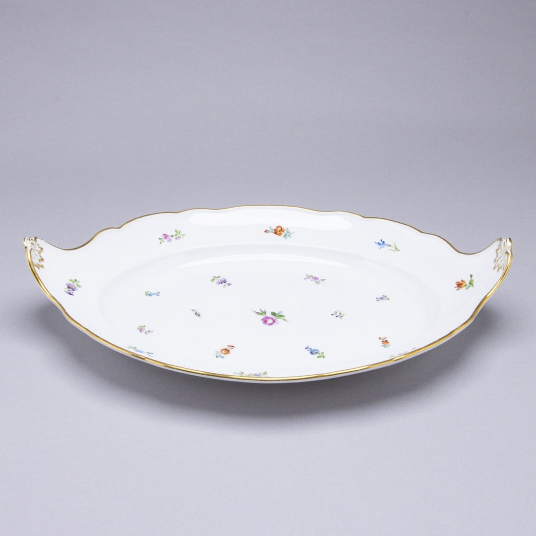 Large oval platter with raised shell handles - scattered flowers. Meissen 1850-1924. (1 of 1)