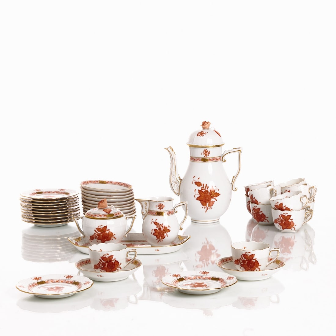 40-piece mocha service for 12 people - Apponyi orange (AOG), Herend 1960s-1970s: 40-piece mocha service for 12 people - Apponyi orange (AOG). Herend Porcelain Factory, Herend 1960s-1970s. Porcelain, white, glazed. Decorated in orange-red and gold. Gold rim. Ozier relief. Blue mark