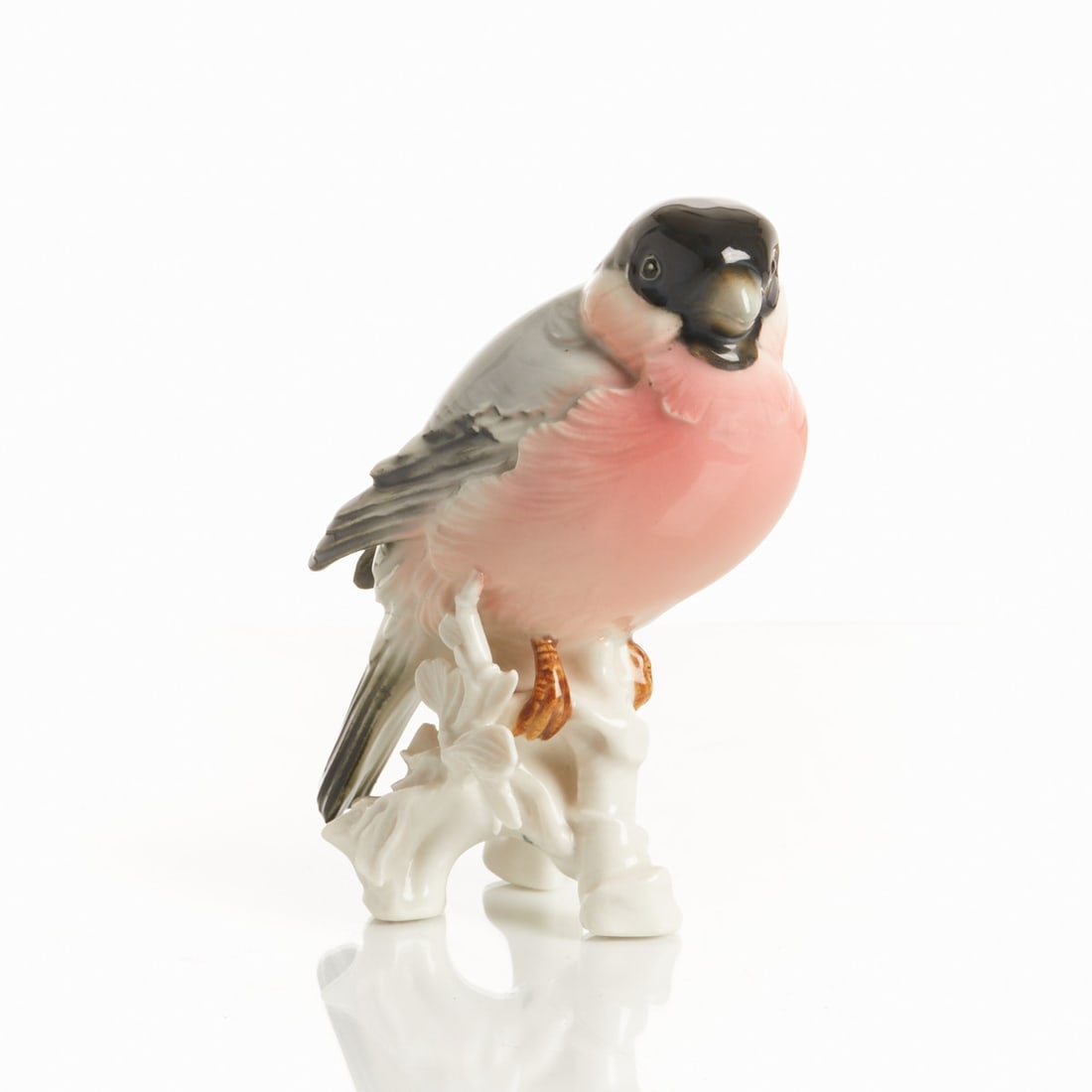 Bullfinch on branch base, Porcelain Factory Karl Ens, Volkstedt from 1919 (1 of 2)