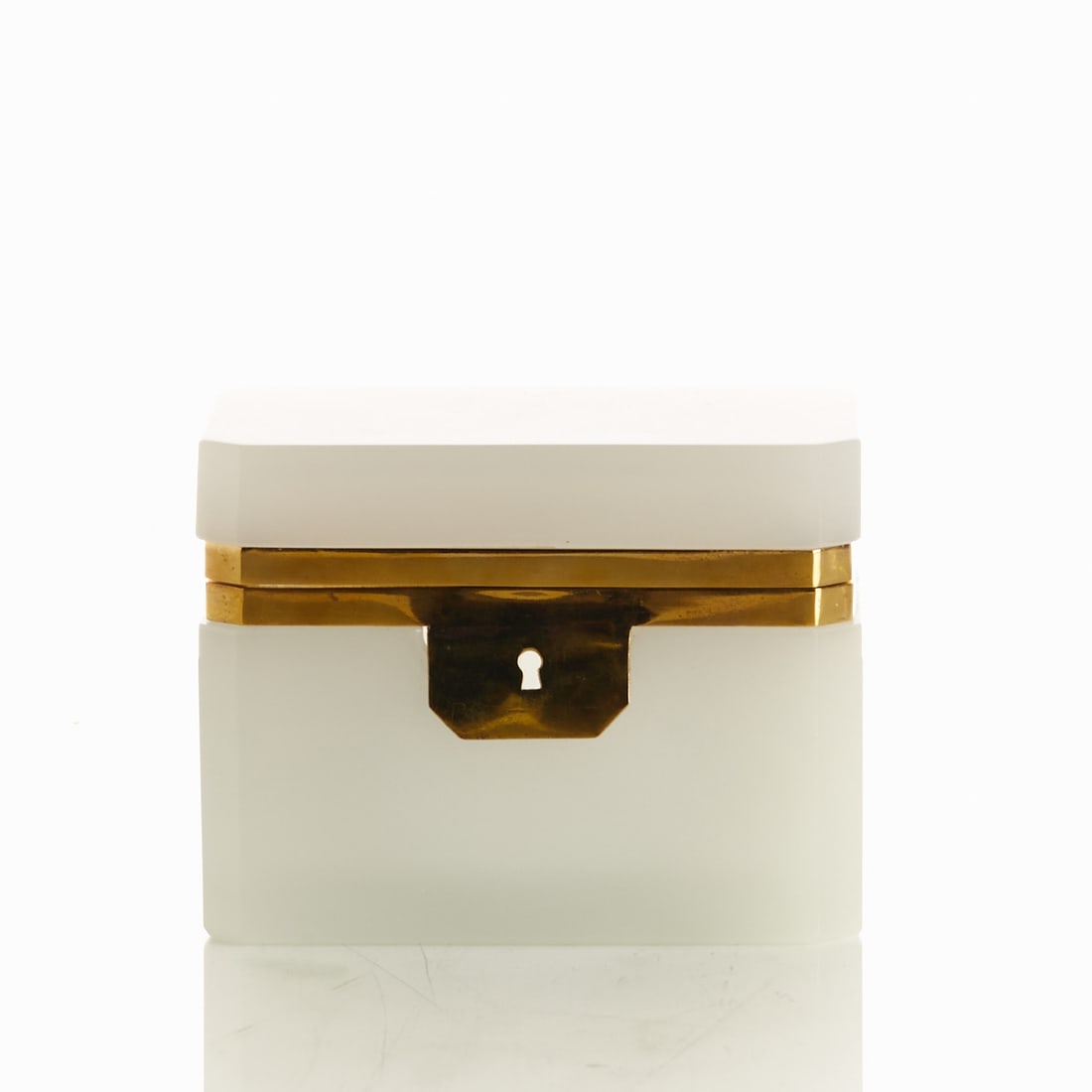 Rectangular lidded box with keyhole - Art Deco. France, circa 1935-1940.: Rectangular lidded box with keyhole - Art Deco France, circa 1935-1940. Thick-walled, white opal glass, ground and polished. Brass plate with keyhole on the front (lock and key missing). Brass mountin