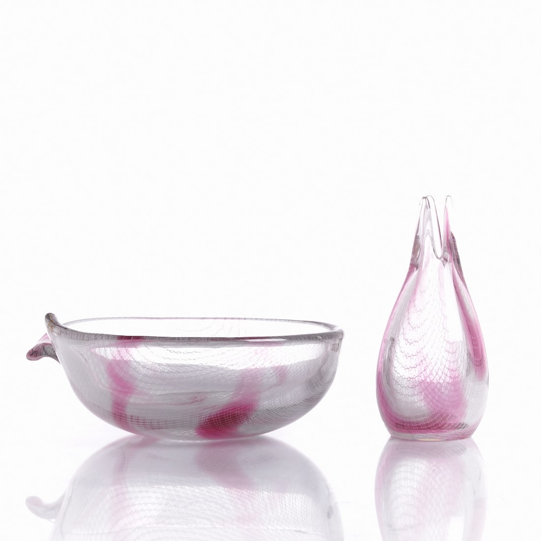 Bowl and vase HARRTIL with interwoven glass threads. Design Milos Pulpitel for Glashütte Harrachov: Bowl and vase HARRTIL with interwoven glass threads Design Milos Pulpitel for Glashütte Harrachov / Czech Republic. Thick-walled, colorless glass with fine opaque white lattice work and a pink ba