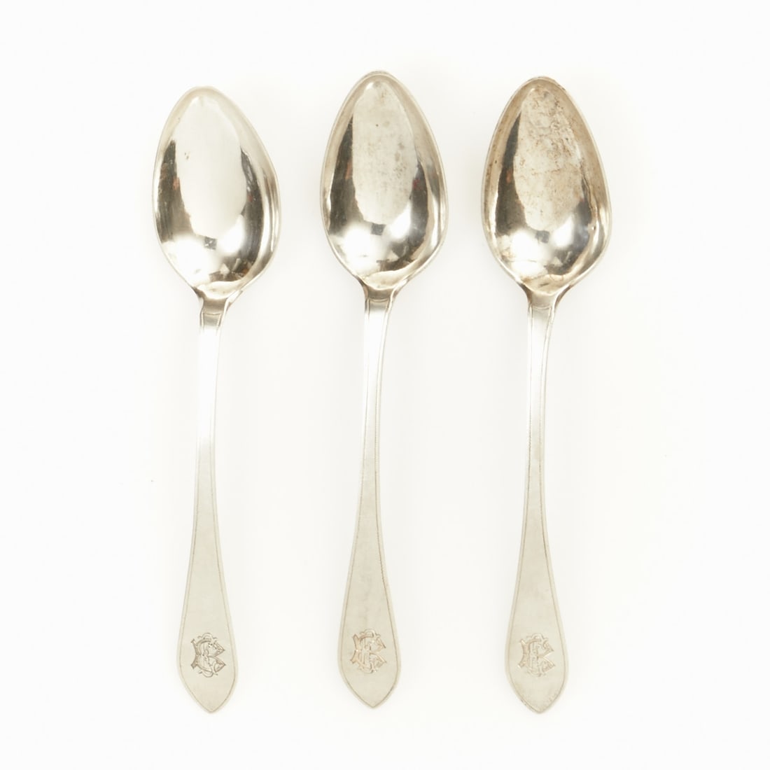 3 Biedermeier Table Spoons: 3 Biedermeier table spoons Johann Carl Franz August Sonnabendt/Berlin, circa 1810. 812.5 silver. Hallmarks: Maker's mark, 13. L. 22.5 cm. Weight: 124 g. Monogram.
