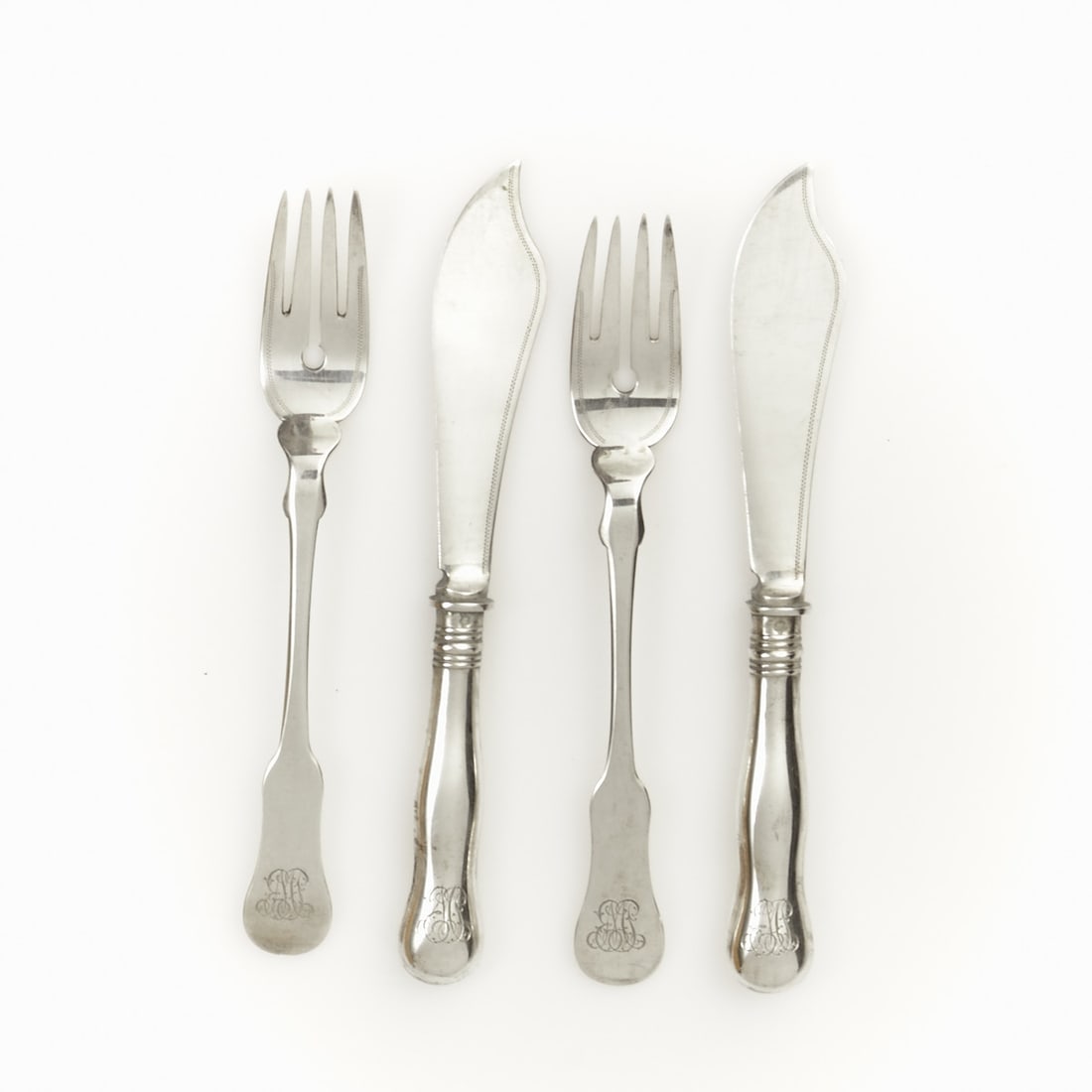 24-piece Fish Cutlery: 24-piece fish cutlery set Austria, circa 1900. 800 silver. Hallmarks: maker's mark, Diana head. Weight: 1290 g. 12 fish forks L. 19 cm. 12 fish knives L. 20 cm.