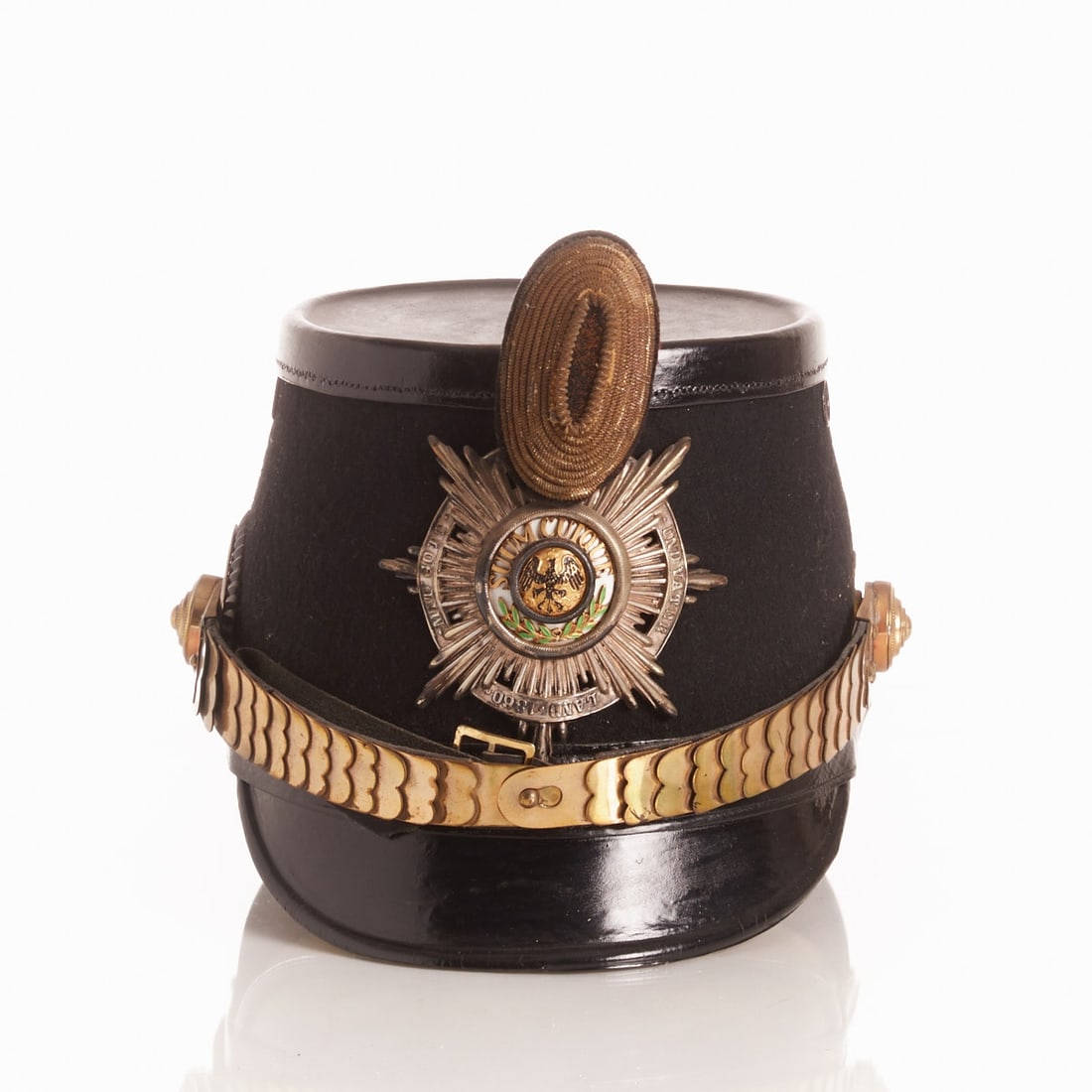 Shako - Prussian Guard Jäger: Shako - Prussian Guard Jäger Black leather body with felt trim and lacquered leather top. Silver-plated Guard Star applied to the front with an enameled medallion of the Order of the Black