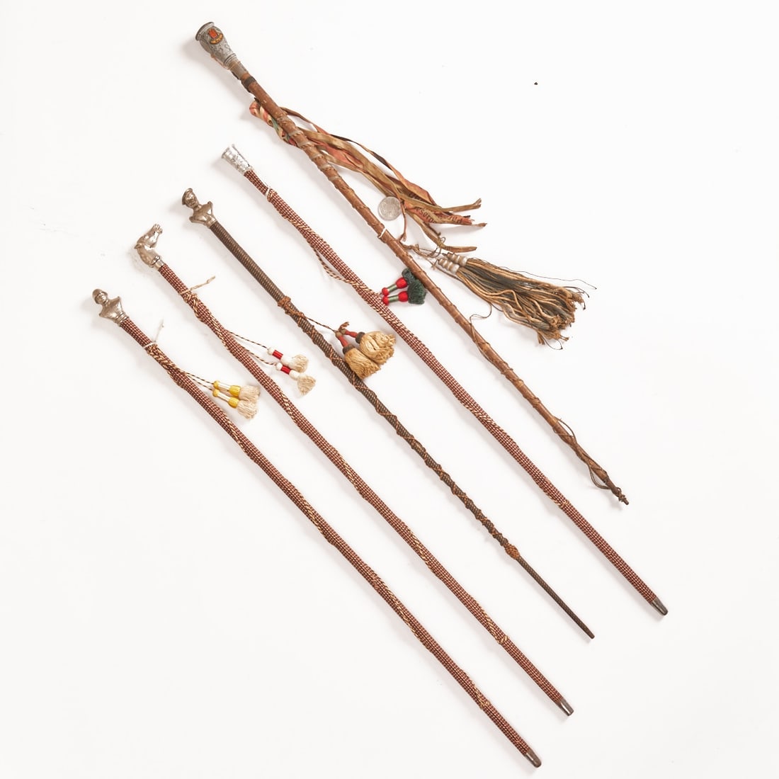 Collection of Reservist Canes: Collection of reservist canes 19th century. 5 pieces, wood, fabric, pewter mounts. Wehrmacht artillery, green and red tassels, L. approx. 92 cm. Cavalry company, red and white tassels, L. approx. 92
