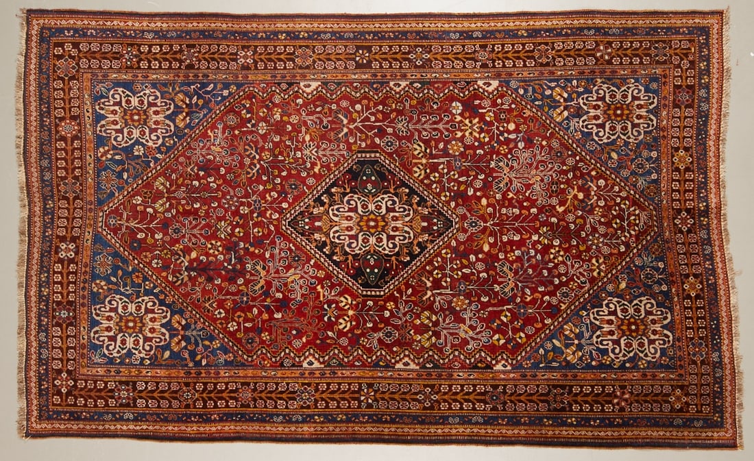 Bidjar Halwai: Bidjar (Halwai) Western Persia, circa 1900. Wool on cotton. Approx. 239 x 144 cm. In the strong brick-red inner field, a strictly composed, rhombic central medallion, surrounded by a densely knotted