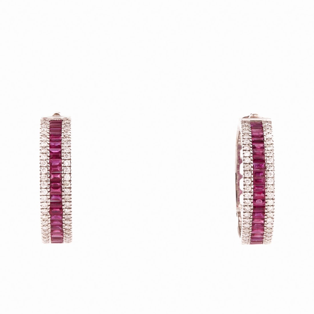 Pair of Hoop Earrings with Rubies and Brilliant-cut Diamonds: Pair of Hoop Earrings with Rubies and Brilliant-cut Diamonds 750/- white gold, stamped. Total weight: 16.81 g. Approx. 96 brilliant-cut diamonds totaling approx. 1.32 ct. Approx. 48 baguette-cut