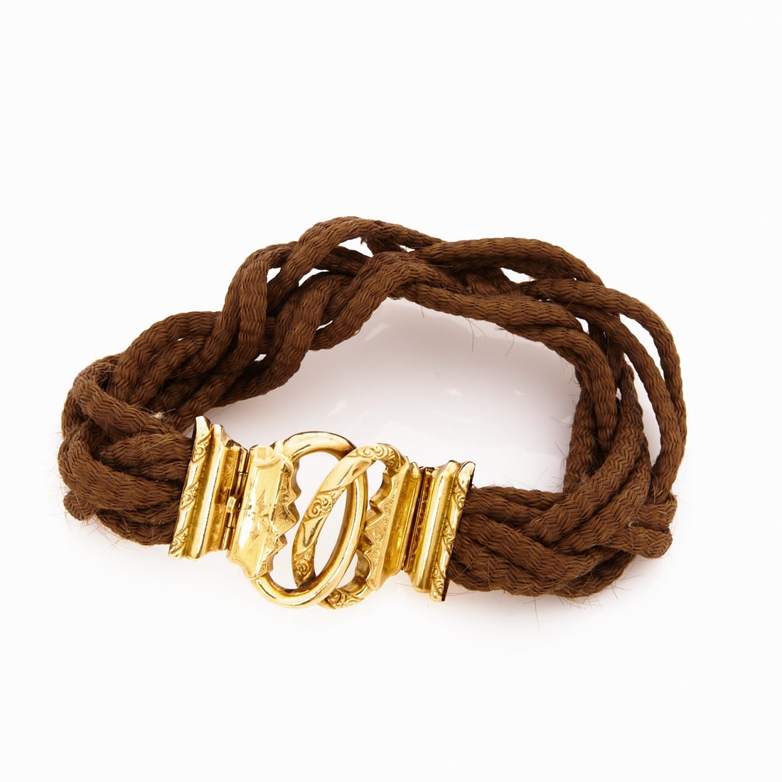 Antique Choker made of Braided Hair: Antique Choker made of Braided Hair Biedermeier, probably France around 1850. 750/- yellow gold and rose gold, stamped. Total weight: 20.5 g. Hallmark: Eagle's head (tête d'aigle). L. 29 cm. W.