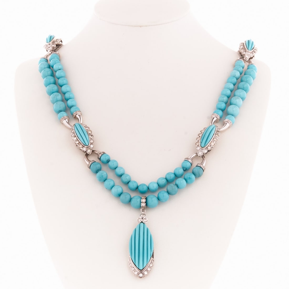 Turquoise Necklace with Diamonds: Turquoise necklace with diamonds 585/- white gold, stamped. Total weight: 102.8 g. Various diamonds, partly brilliant cut, total approx. 5.46 ct. Various turquoises. L. 58 cm. W. 7.5 cm. Good