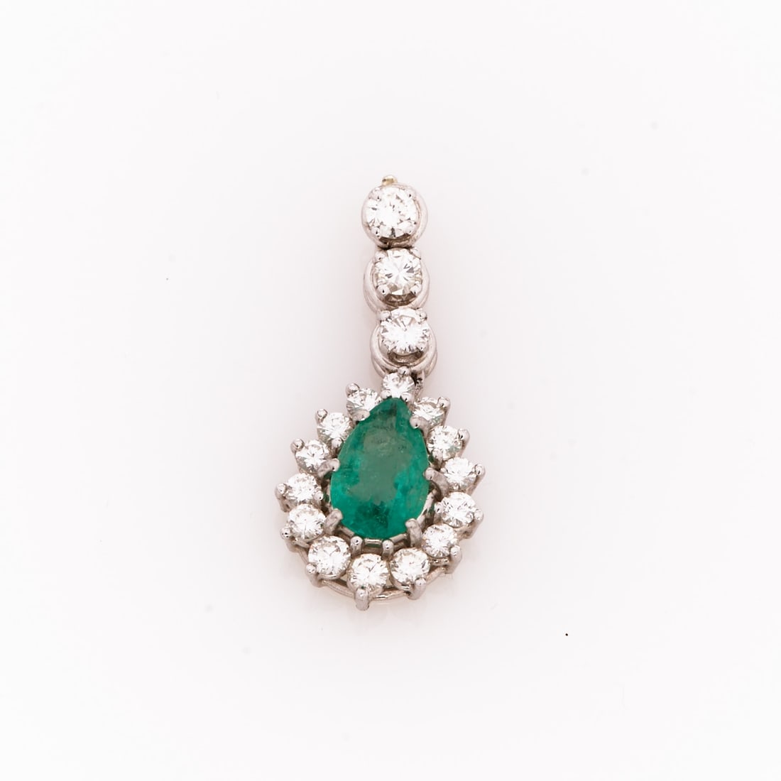 Classic Emerald Pendant with Diamonds: Classic Emerald Pendant with Diamonds 750/- white gold, hallmarked. Total weight: 3.7 g. 1 drop-cut emerald approx. 1-1.5 ct. 17 brilliant-cut diamonds total approx. 1 ct (w-tcr/vsi-si). Dimensions: