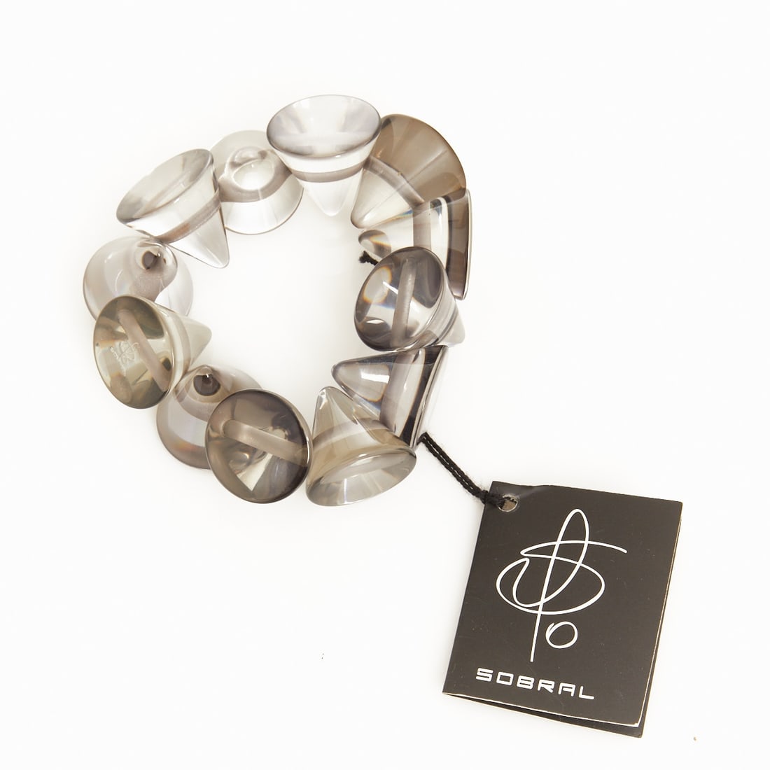 SOBRAL - Bracelet with Conical Beads: SOBRAL - Bracelet with conical beads Sobral, Brazil, approx. 1980 - 1990s. Plastic, elastic band. Weight: 75 g. Bead dimension: approx. 2.7 cm. Bracelet internal dimensions: approx. 5 cm. Signed with