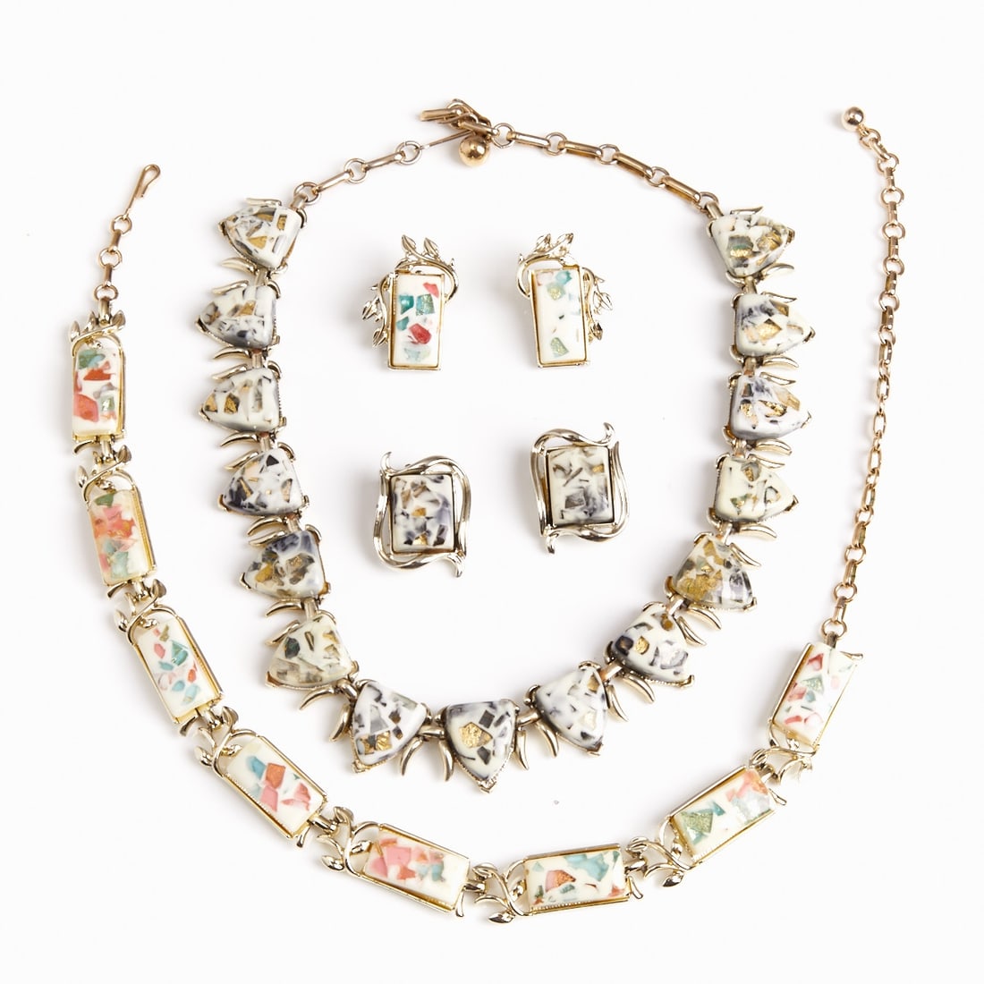 CORO - Two Vintage Sets with Necklace and Ear Clips (4 Pieces): CORO - Two vintage sets with necklace and ear clips (4 pieces) Coro (Cohn & Rosenberger Jewelry), New York, USA, circa 1950s. Metal, silver-colored / white gold-colored. Lucite. Weight: 126 g. Nec