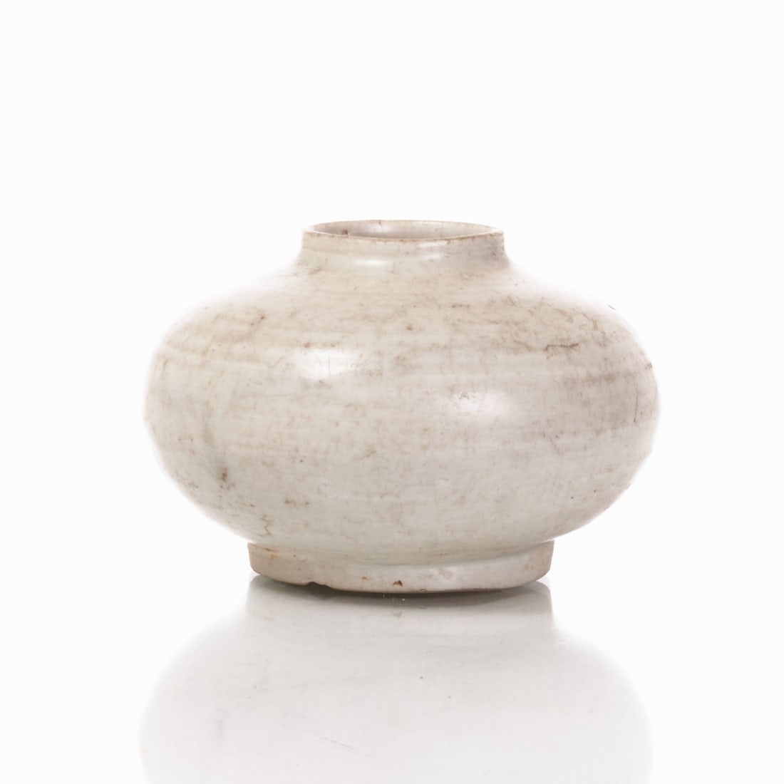 Small porcelain water container ''Water Pot'', Song Ding Ware Kiln: Small porcelain water container ''Water Pot'', Song Ding Ware Kiln China, Song Dynasty or later. Porcelain with whitish glaze inside and out. H. 6.5 cm, D. approx. 9.5 cm. Significant signs of age,