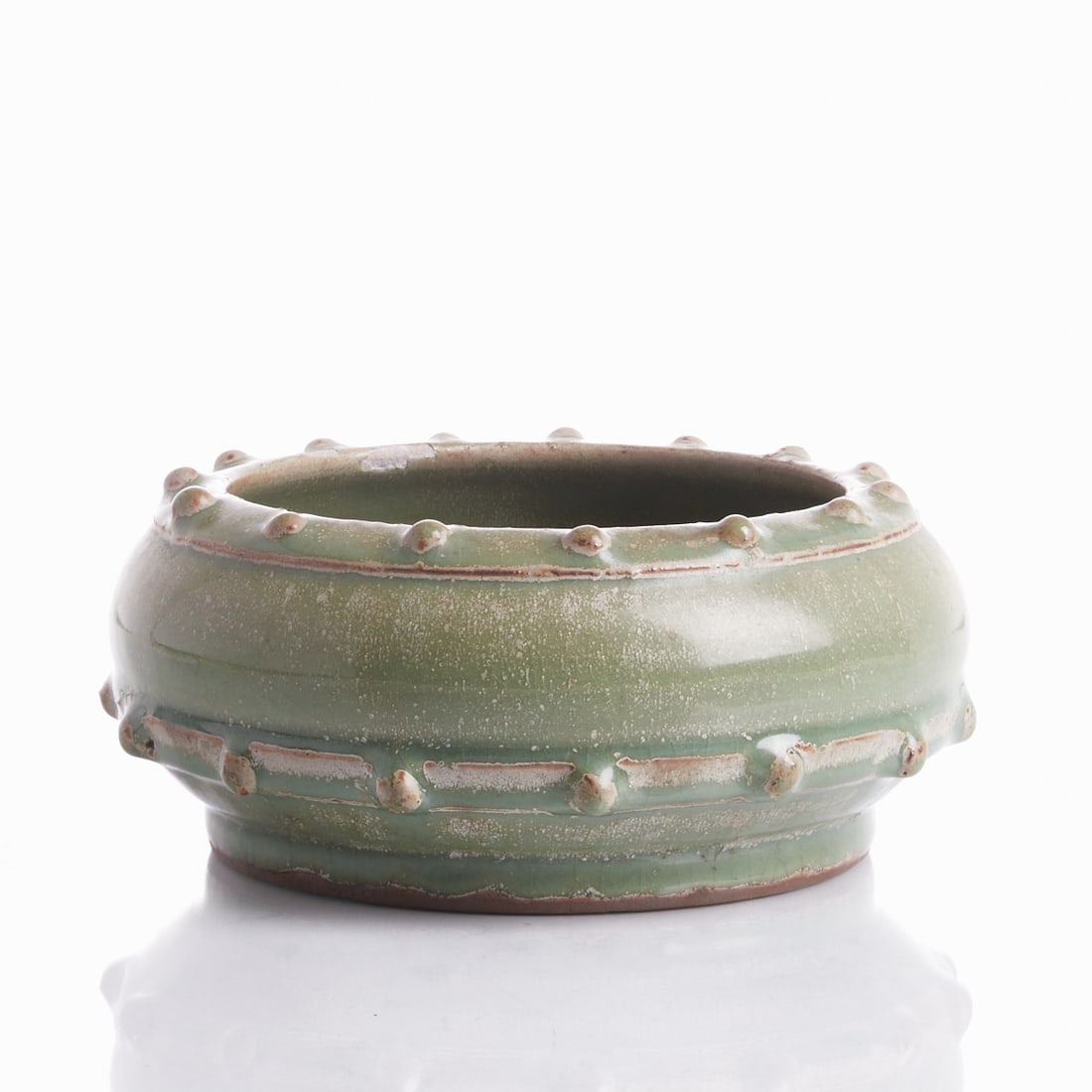 Longquan Celadon Bowl: Longquan Celadon Bowl China, probably 18th century. Ceramic, glazed, beautiful celadon color with white inclusions and craquelure pattern. H. 9 cm, D. approx. 21 cm. Condition: Traces of age and use,