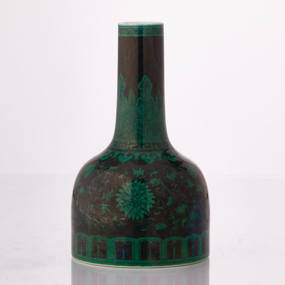 Famille-noir Vase: Famille-Noir Vase China, Qing Dynasty. Porcelain, glazed, green background, painted black under the glaze. H. 18.5 cm, D. of base: 10.8 cm, D. of mouth: 3.5 cm. Six red Chinese character mark on the