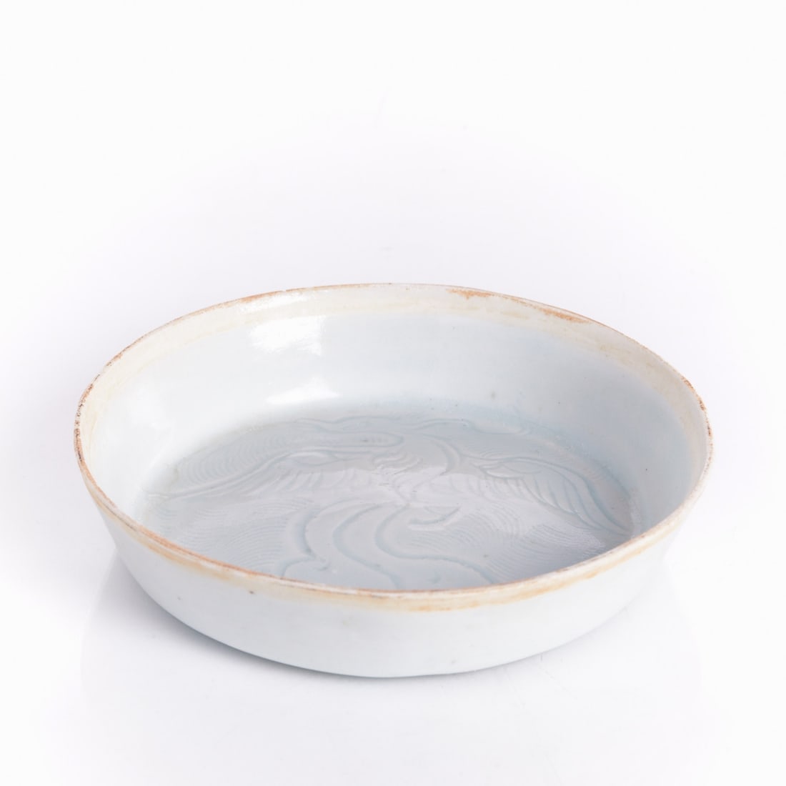 Small Qingbai Bowl in Yu?¨guang S?¨ (Moonlight Color): Small Qingbai Bowl in Yuèguang Sè (Moonlight Color) China, Ming Dynasty or later. Ceramic, glazed. H. 2.5 cm. D. of mouth: 12 cm. A phoenix is engraved on the inside of the bowl. The rim