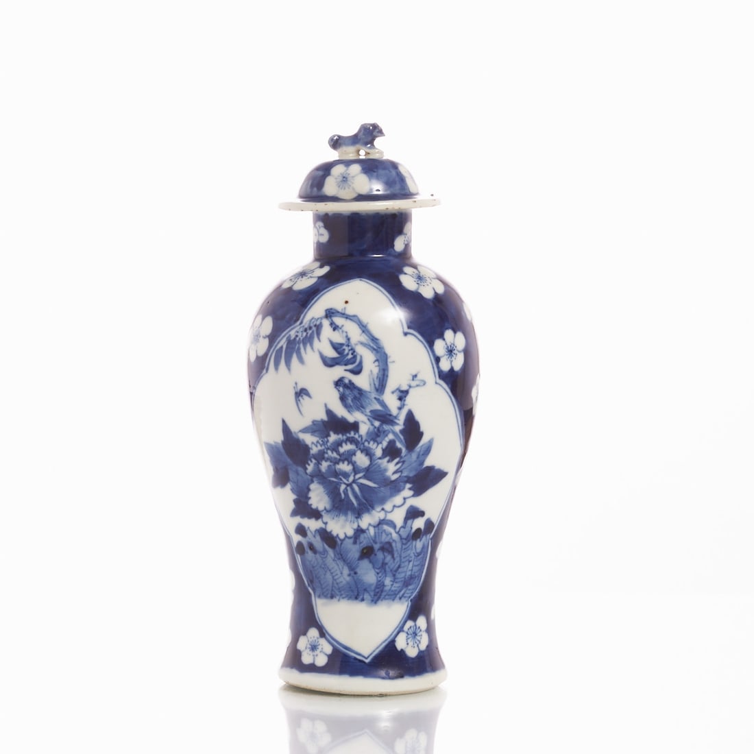 Blue-and-white Baluster Vase with Kangxi Mark: Blue-and-white Baluster Vase with Kangxi Mark China, probably late 19th century. Porcelain, glazed and painted in underglaze blue. H. 25.5 cm. Underglaze blue four-character base mark: Kangxi Nianzhi 