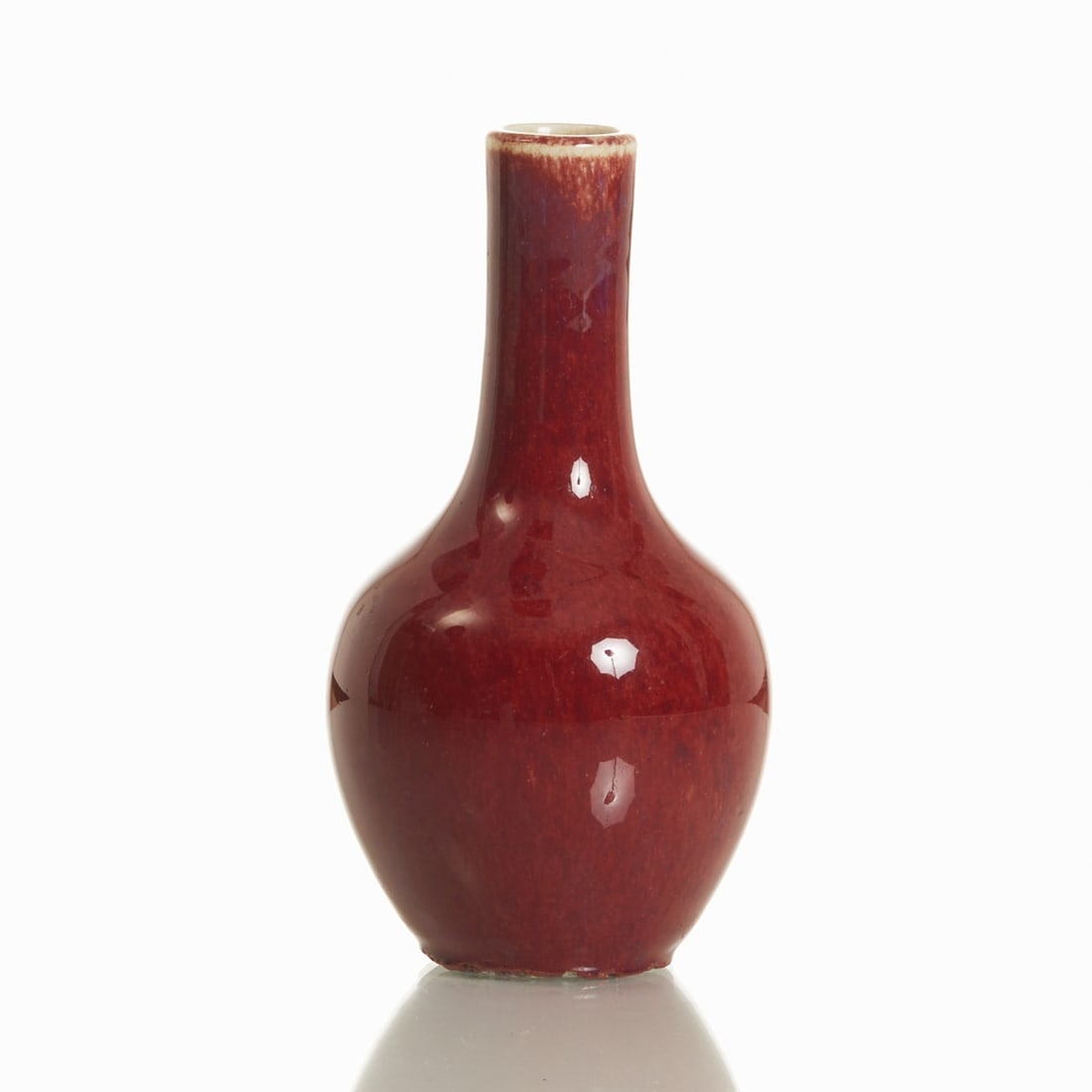 Langyao Meiping Vase with Sang de Boeuf Glaze: Langyao Meiping vase with Sang de Boeuf glaze China, probably Qing Dynasty. Porcelain, glazed, with so-called "oxblood" glaze (Sang-de-Boeuf). H. 14.5 cm. Attractive craquelure and flowing d
