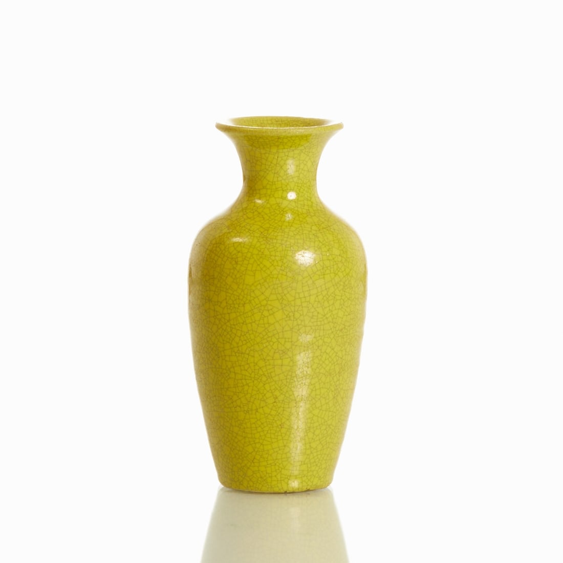 Small Yellow-Green Craquelure Vase in Ge-Yao Style: Small yellow-green craquelure vase in Ge-Yao style China, probably 19th-20th century. Ceramic, glazed with fine craquelure. H. 11.5 cm, diameter of the mouth: approx. 4 cm. In Ge-Yao style. Condition: