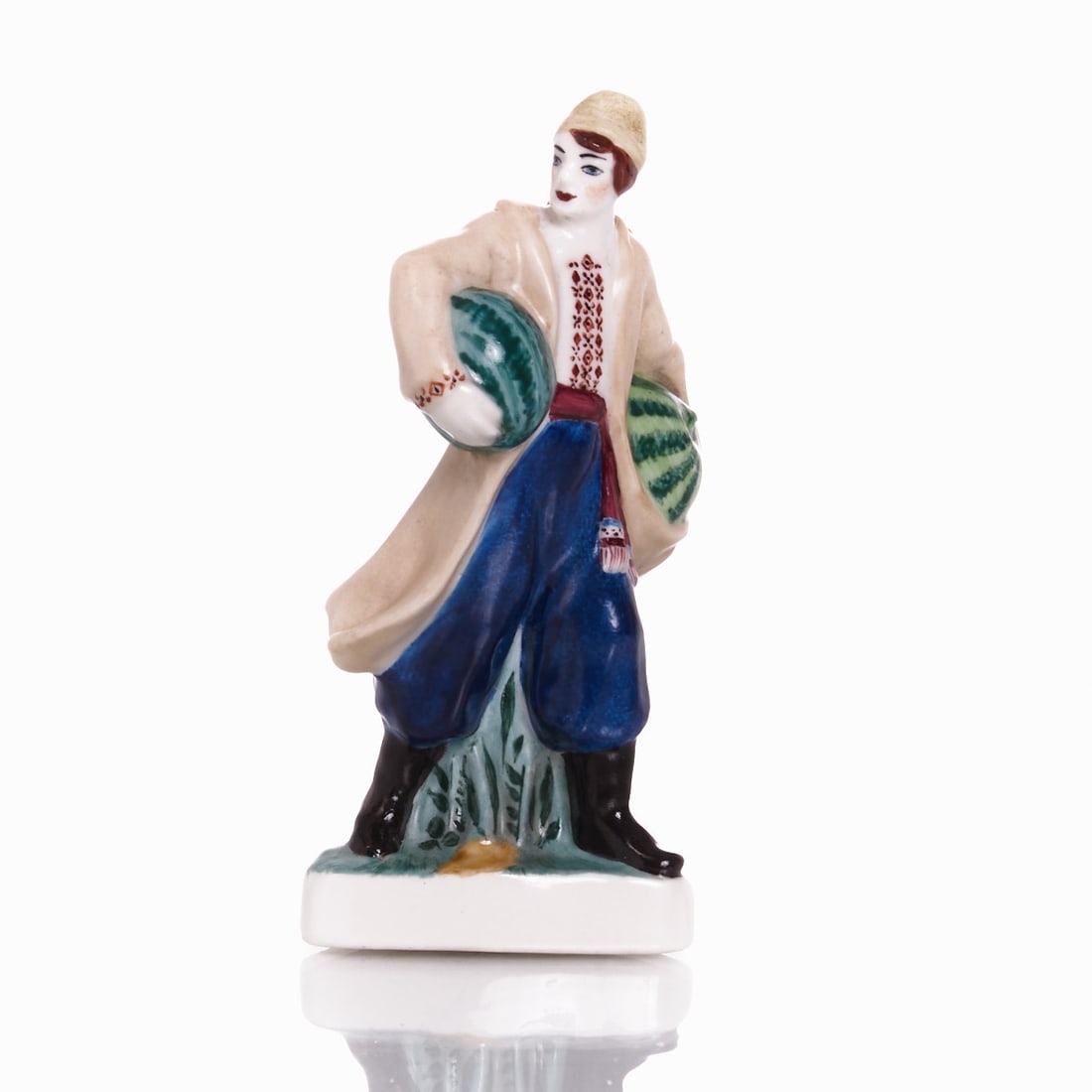 Figure 'Ukrainian Man with Watermelons' -: Figure "Ukrainian Man with Watermelons" - Natalja Danko Lomonosov / Lomonossow Leningrad (LFZ), 1939. Porcelain, white, glazed. Polychrome painted. On the unglazed base, green mark LFZ. H. 1