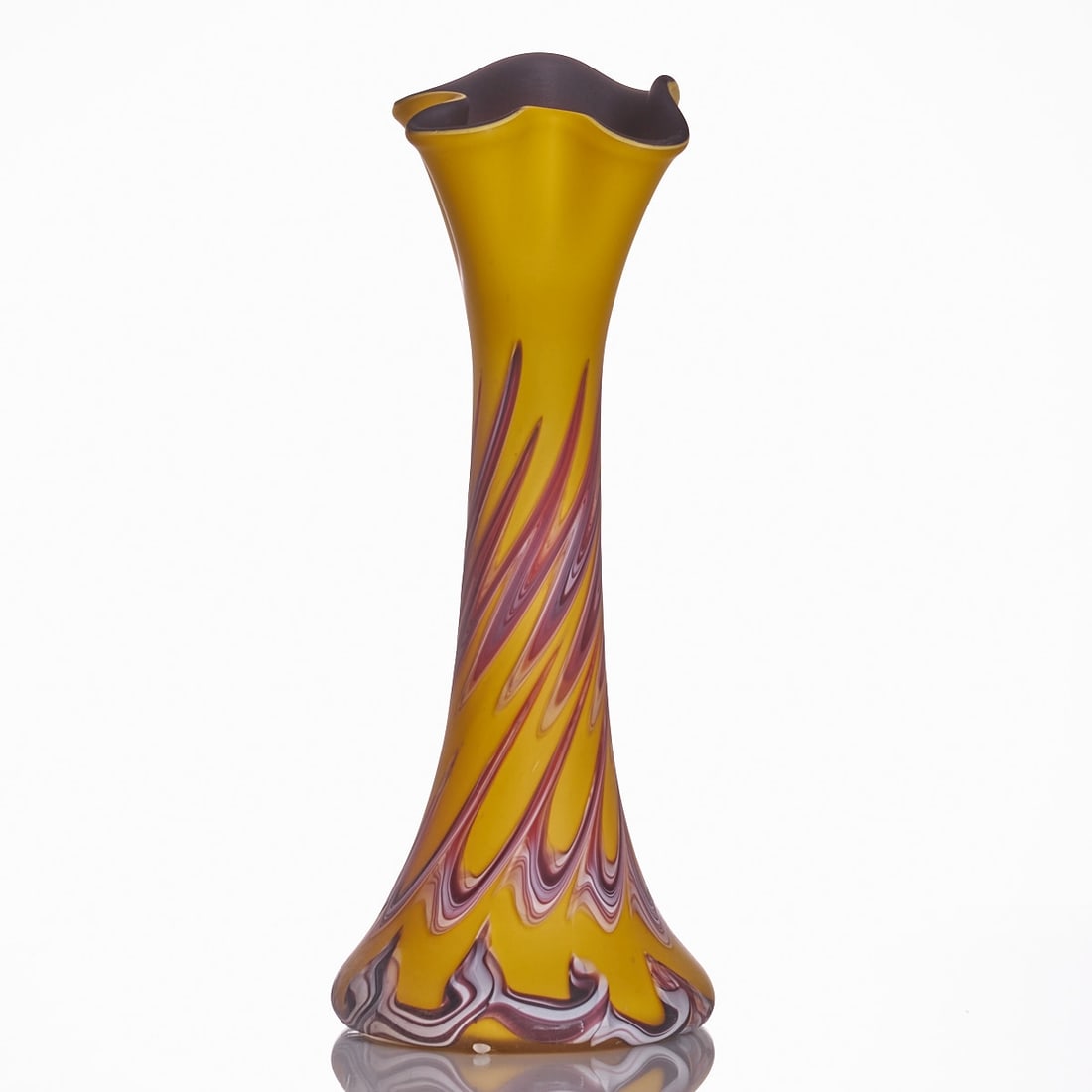 Floor vase with multi-pinched rim. Azerbaijan, mid-20th century.: Floor vase with multi-pinched rim Azerbaijan, mid-20th century. Brown glass, overlaid with yellow glass. Colorless glass with red, opaque white, and violet combed threads. Pontil mark. Unmarked. H.