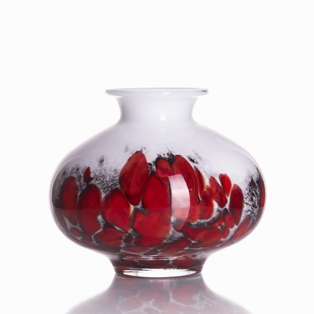 Spherical vase: Spherical vase Opaque white glass with red and black irregular fusions, overlaid with colorless glass. Ground pontil mark. Unmarked. H. 19 cm.