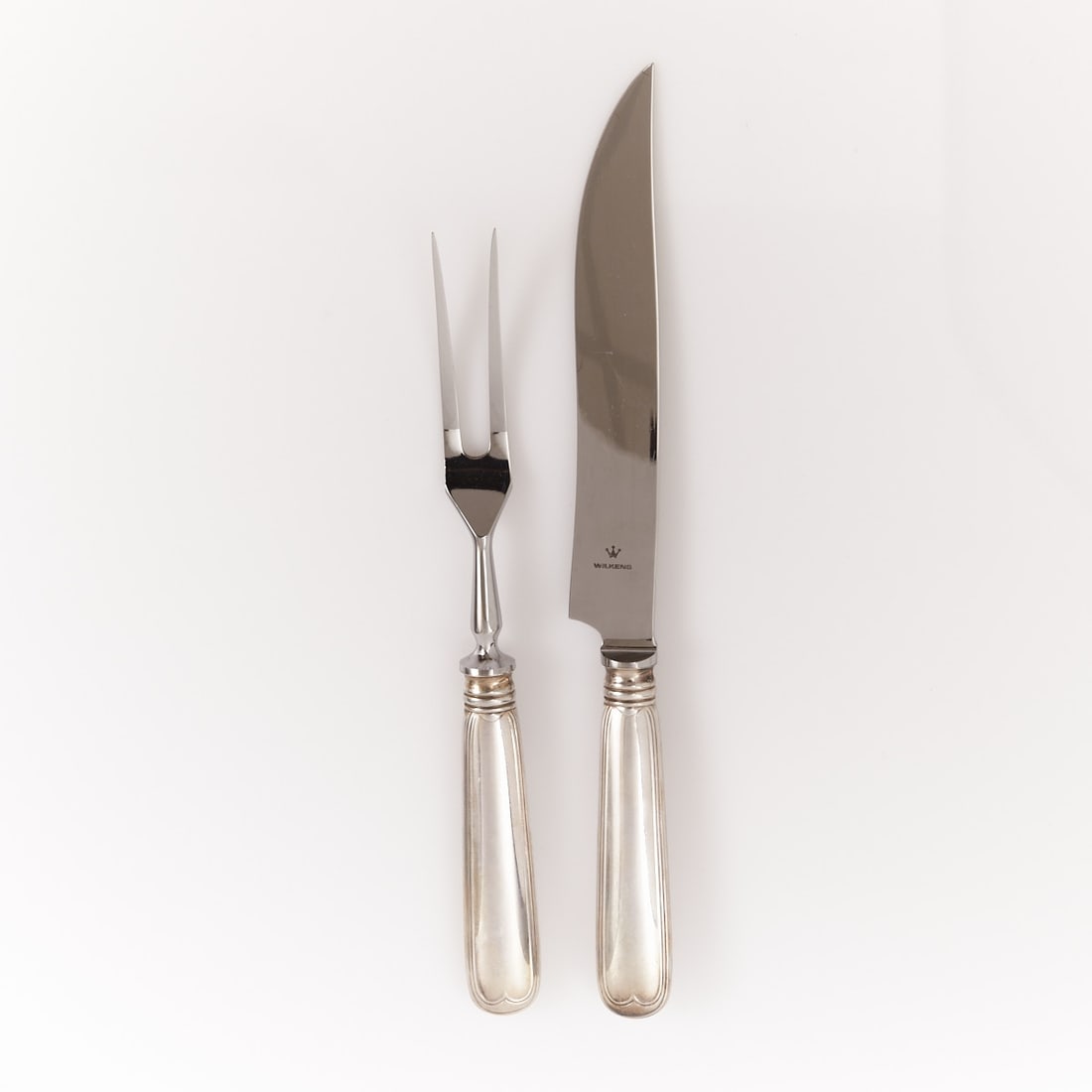 2-piece carving cutlery set with thread pattern: 2-piece carving cutlery set with thread pattern Wilkens/Bremen. 925 silver. Hallmarks: maker's mark, 925, crescent/crown. L. 24 cm or 28.5 cm. Weight: 276 g (weighted).
