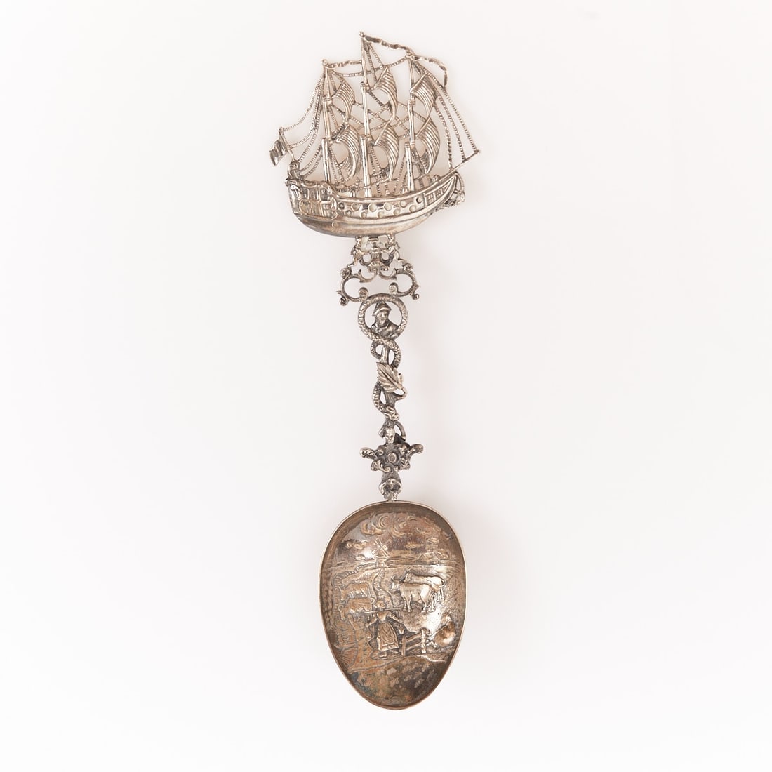Ornate spoon with three-master (sailing ship): Ornate spoon with three-master (sailing ship) Hanau, circa 1900. Silver. Hallmarks: maker's mark. L. 31.5 cm. Weight: 184 g.