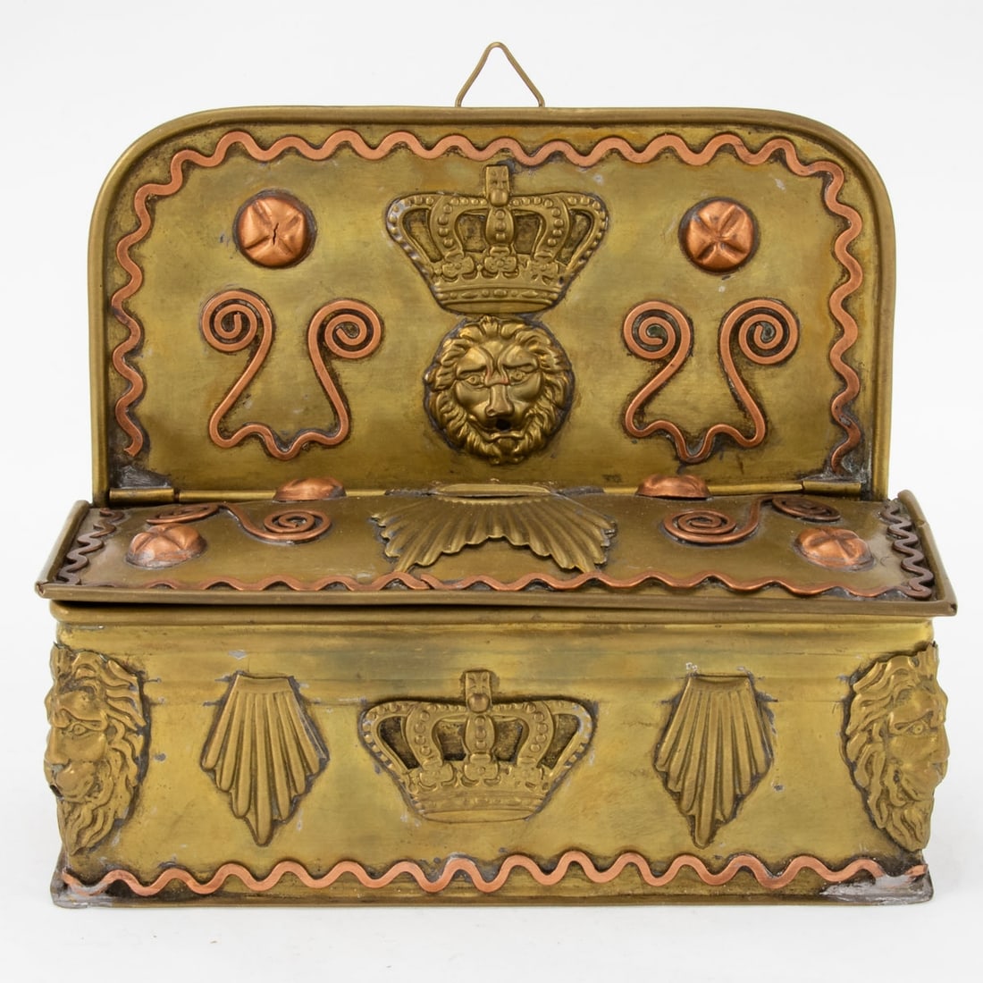 Wall Casket 19th: Wall Casket 19th century. Brass and copper. 7 (14) x 17 x 7.4 cm. Slightly restored, minor signs of wear. Centrally with applications of a crown and a lion's head, as well as two more crowns. Around
