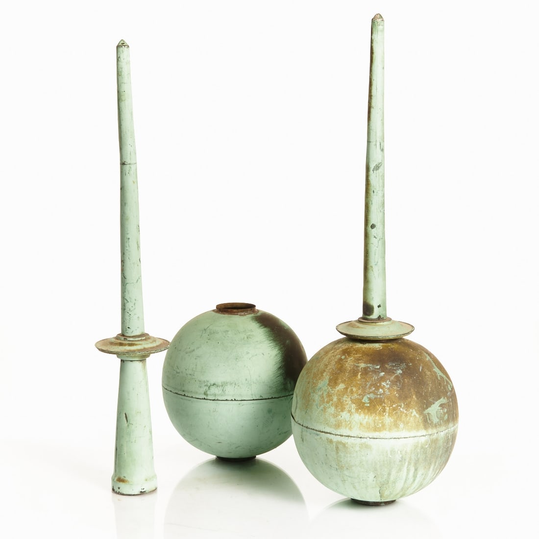 Two church steeples / tower tops: Two church steeples / tower tops German, 19th century. Copper sheet, sphere diameter 22 cm each. Total height with spire 58 cm or 75 cm. Spherical finials with long spires. Originally used as architec