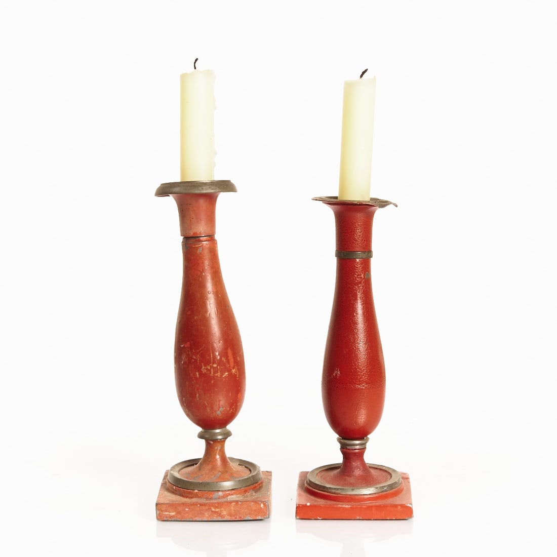 Pair of rare Stobwasser candlesticks - Red: Pair of rare Stobwasser candlesticks - Red Braunschweig, Wolfenb??ttel or Berlin, Stobwasser, circa 1820. Pewter, red lacquered. Height 20.5 cm and 22 cm, base area 7.5 ?— 7.5 cm each. Square plinth