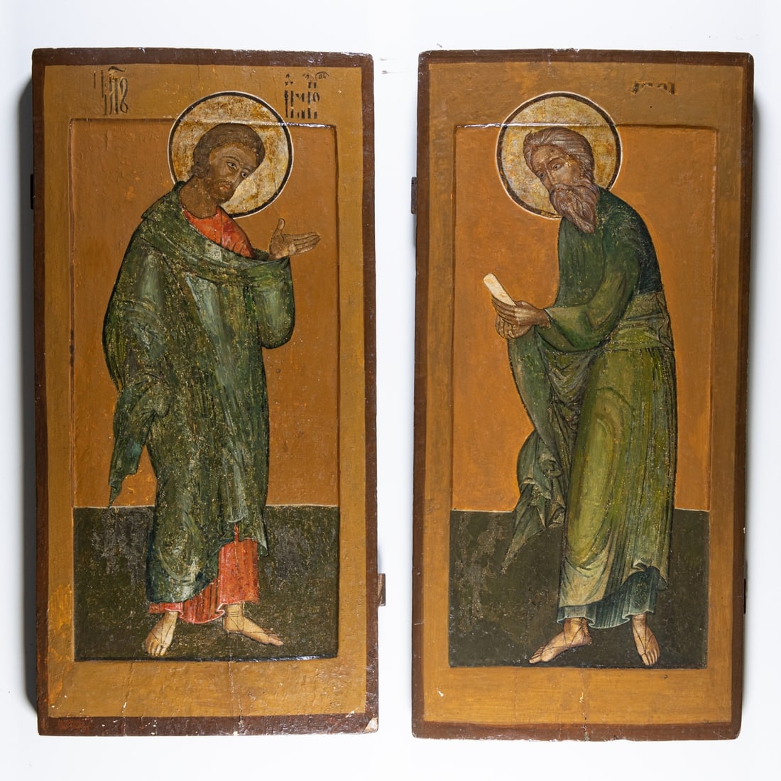 Pair of Icons: Pair of iconostasis panels Russia, first half of the 17th century. - probably Saint Andrew and a Saint - Each egg tempera on chalk ground, wood, 38 cm x 79 cm. Each with two sponki on the reverse,