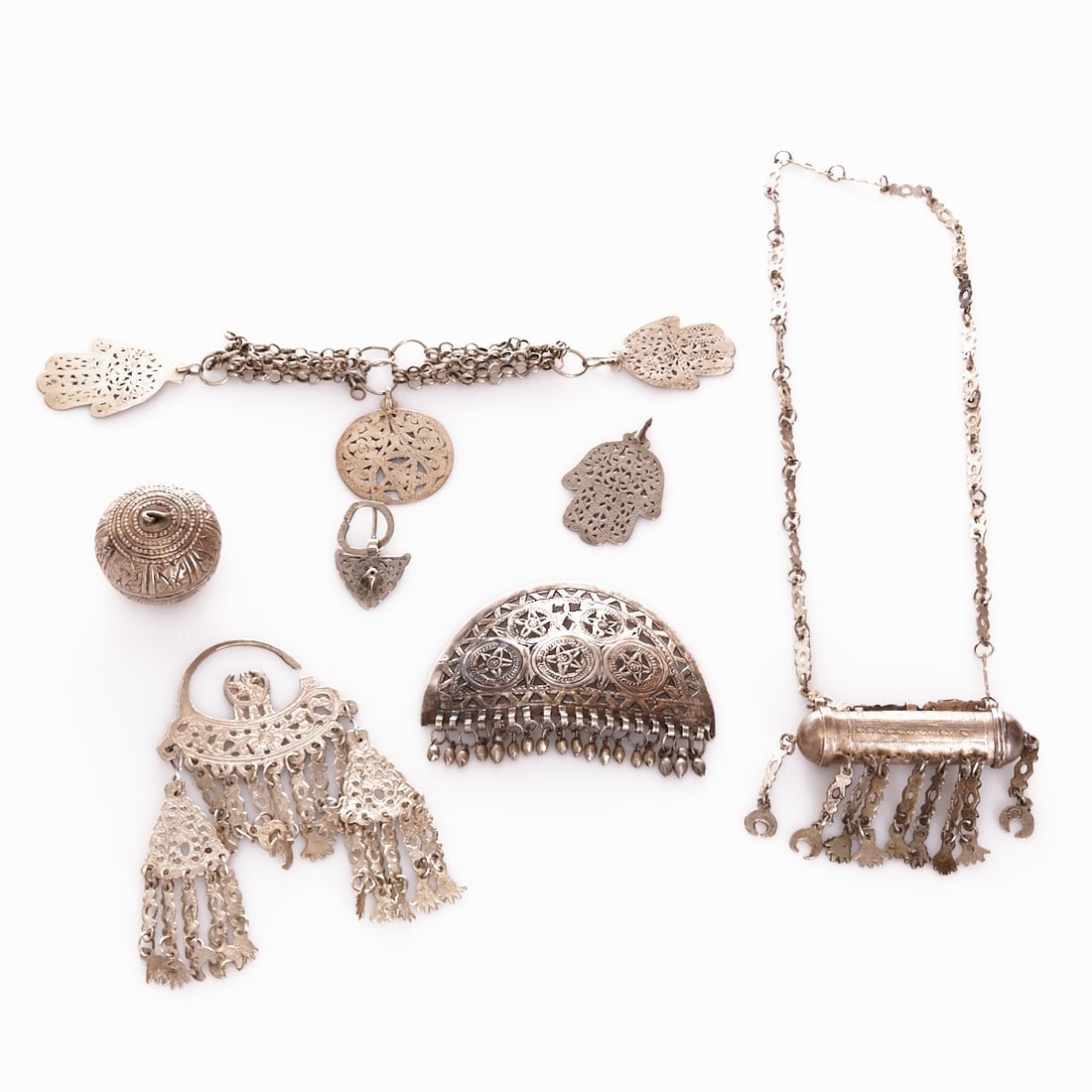 Ethnological Jewelry and Amulet Collection: Ethnological Jewelry and Amulet Collection Probably North Africa, 19th/20th century. Consisting of 6 decorative jewelry components, probably in silver and white metal, partly with openwork, pendants a