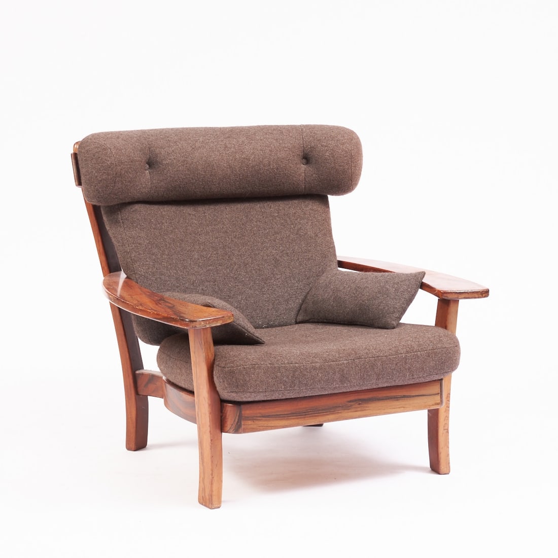Mid-Century Armchair: Mid-Century Armchair Circa 1960/70. Mahogany. 42/87 x 93 x 85 cm. Damaged (Best.). The armchair is in the style of Hans J. Wegner.