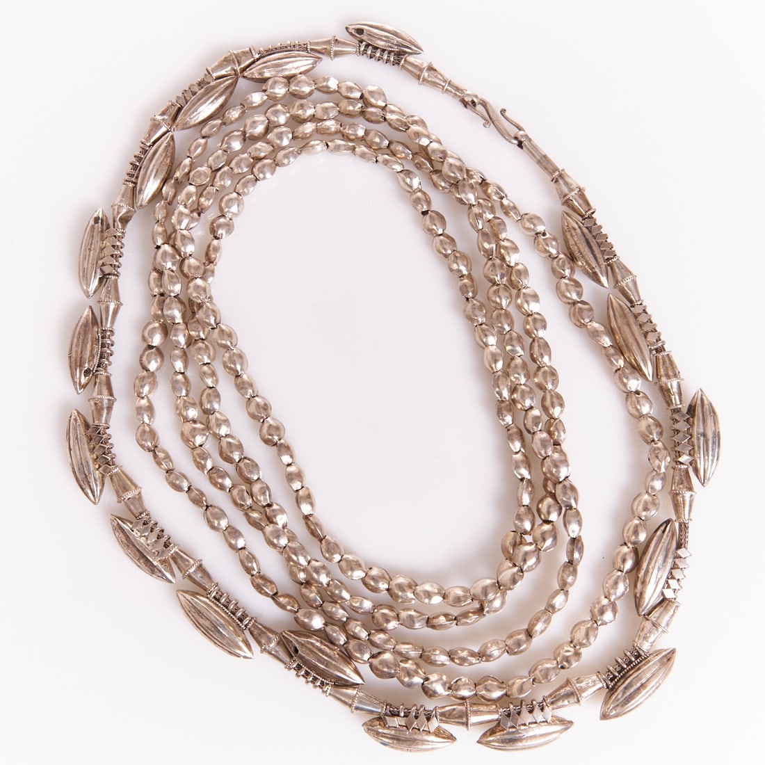 Two South India Silver Tribal Necklaces: Two South India Silver Tribal Necklaces Probably from India, around the 1950s. Silver, unstamped. Weight: 189 g. Necklace length approx. 67 cm and 193 cm. Good condition. One necklace has pointed, hol