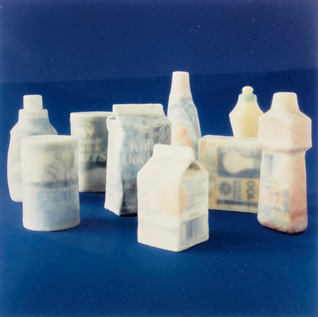 H. N. Semjon: H. N. Semjon 1962 Wiesbaden - Still life with objects with blue background - C-Print/photographic paper. 23 x 23 cm (mat cutout), 51.5 x 51.5 cm (size with frame). Mat. Framed under glass. Semjon is