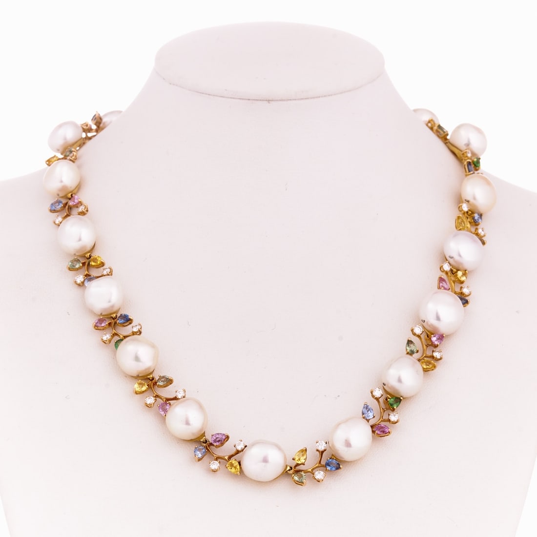 Schoeffel Pearl, Sapphire, Diamond Necklace: Schoeffel Pearl, Sapphire, Diamond Necklace Schoeffel company. 750/- yellow gold, stamped. Total weight: 54.72 g. Hallmarked: Schoeffel. 18 cultured pearls approx. 10-11.5 mm. Various colored sapphire
