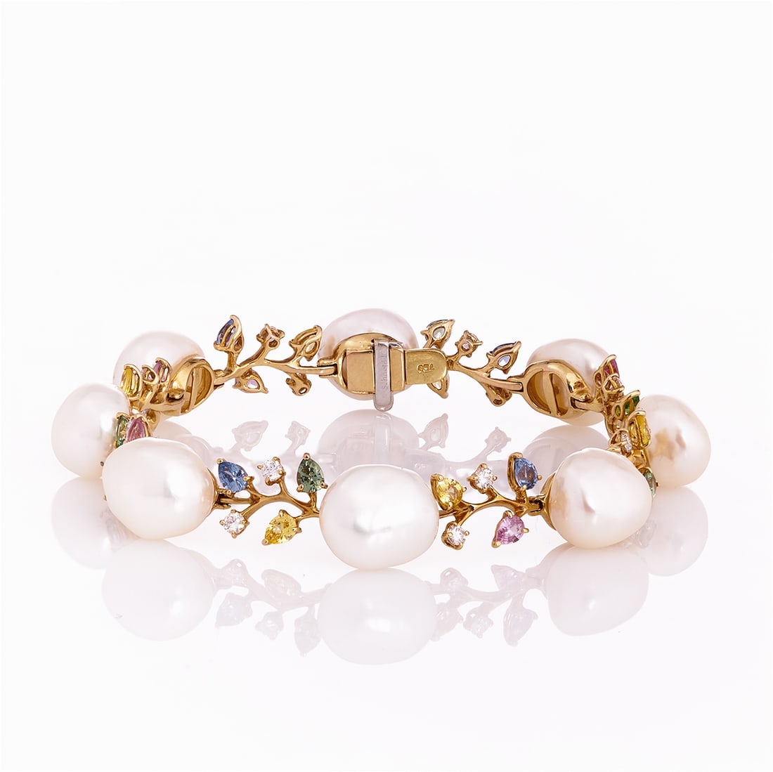 Schoeffel Pearl, Sapphire, Diamond Bracelet: Schoeffel Pearl, Sapphire, Diamond Bracelet Schoeffel company. 750/- yellow gold, stamped. Total weight: 30.11 g. Hallmarked: Schoeffel. 8 cultured pearls approx. 11.5 mm. Various sapphires totaling