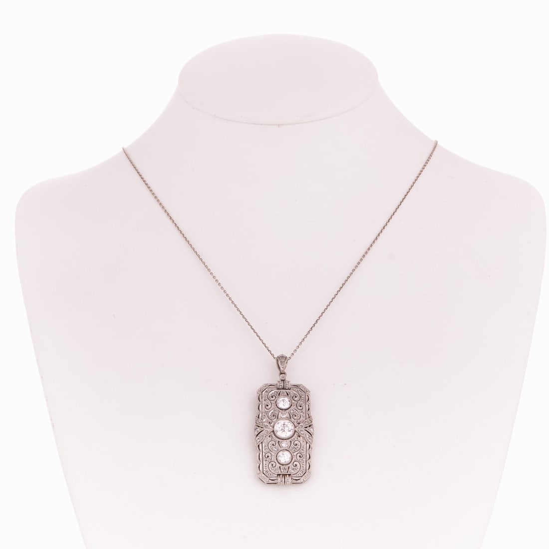 Art Deco Pendant with Old-Cut Diamonds with Chain: Art Deco pendant with old-cut diamonds with chain Art Deco, circa 1920-1930. Probably platinum, unstamped. Total weight: 27.2 g. 3 old-cut diamonds totaling approx. 1 ct. Various old-cut and rose-cut 